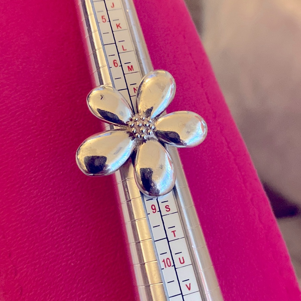 Women’s sterling silver ring, and a size 7 1/2